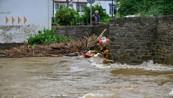 15 июля 2021 года. Ущерб, причиненный наводнениями на реке Вольме в Дале близ Хагена (западная Германия) после сильных ливней
