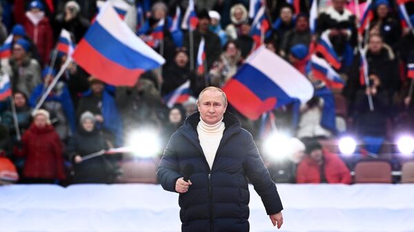Президент РФ Владимир Путин выступает на митинге-концерте в Лужниках, посвященном воссоединению Крыма с Россией