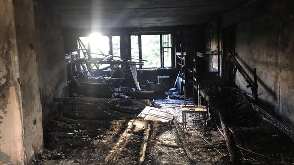 Последствия пожара в хостеле в Москве
