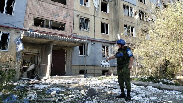 Последствия удара ВСУ по многоэтажке в Алчевске