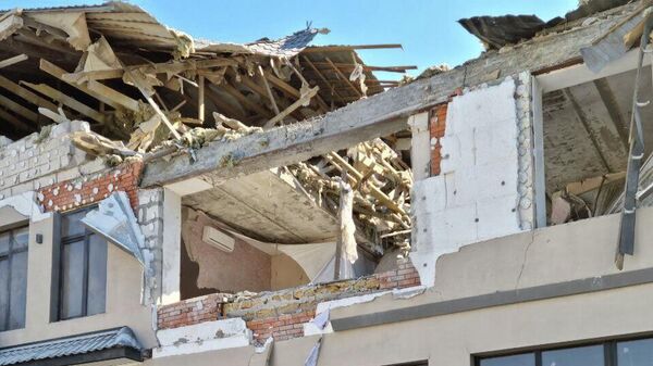 Разрушенная гостиница в центре Херсона, где погибли два человека