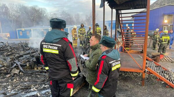 Последствия пожара в строительном городке в Севастополе
