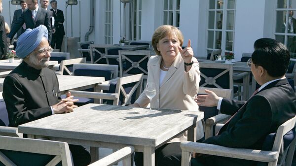 Премьер-министр Индии Манмохан Сингх, федеральный канцлер Германии Ангела Меркель и председатель КНР Ху Цзиньтао (слева направо) во время беседы в Германии