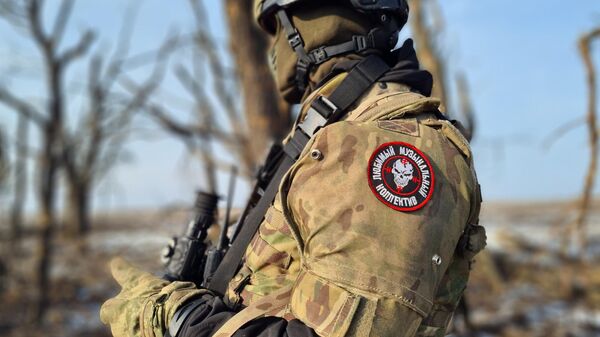 Боец группы Вагнер в Артёмовске (Бахмуте) в ДНР.