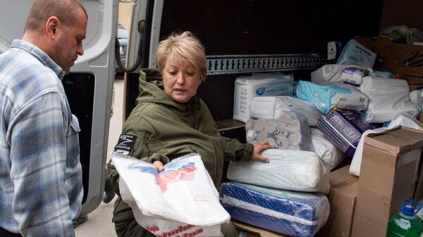 РИА Новости Крым и Крымские феи доставили гуманитарную помощь в Каховку