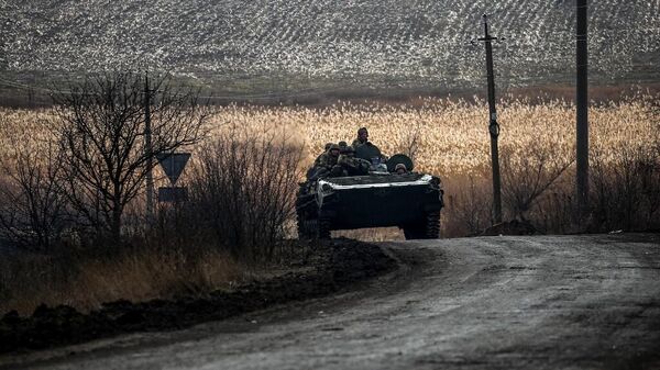 Украинские военные едут на танке