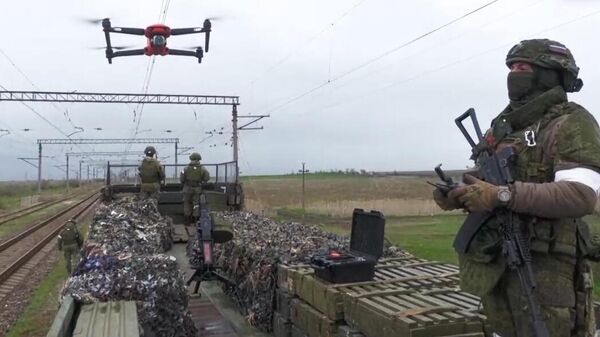 Боевой расчет бронепоезда Байкал железнодорожных войск Вооруженных Сил РФ  в зоне спецоперации