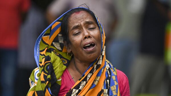 Родственница жертвы столкновения поездов в Индии 