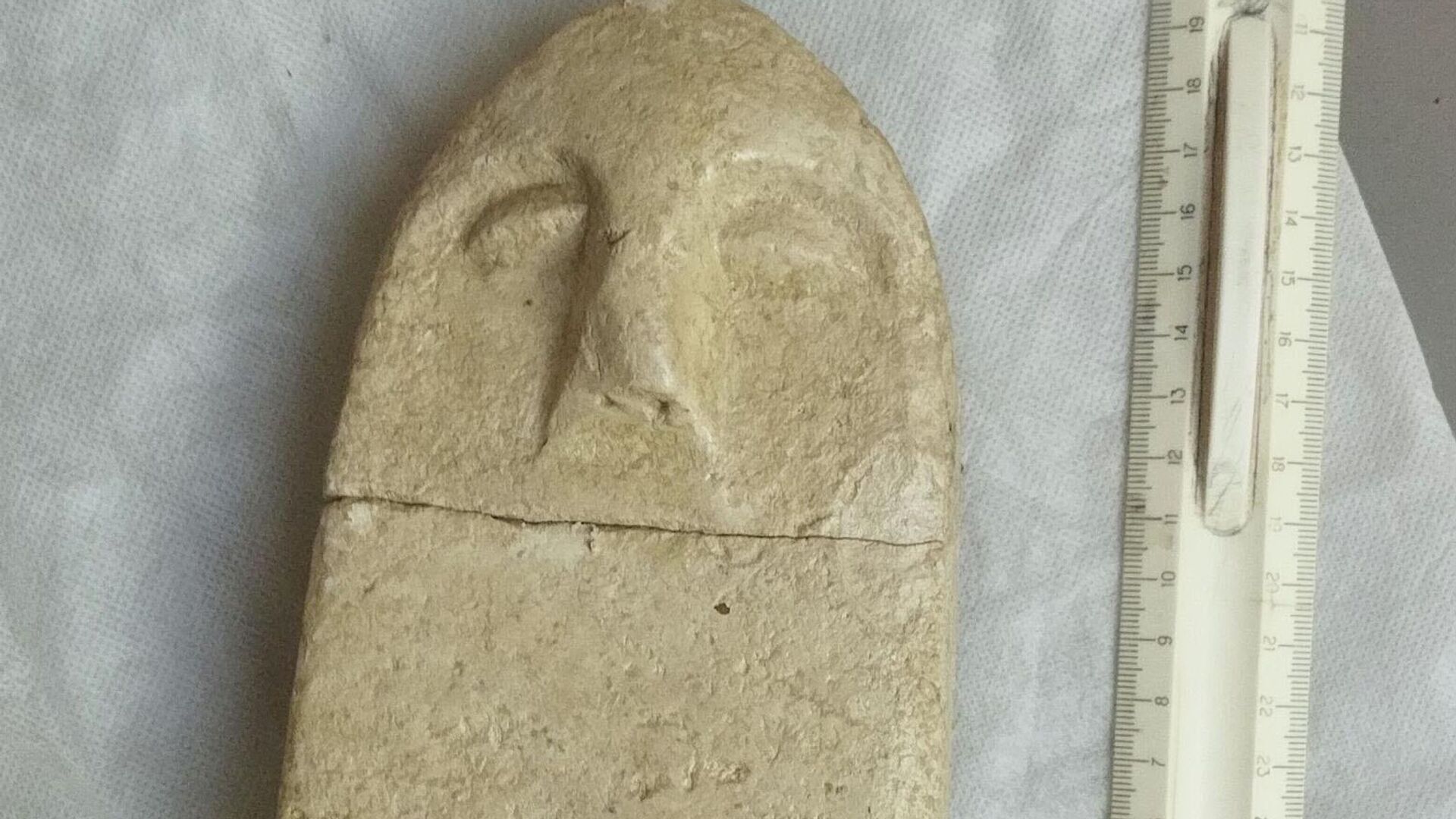 Каменный идол, обнаруженный при раскопках могильника Опушки - РИА Новости, 1920, 18.08.2023