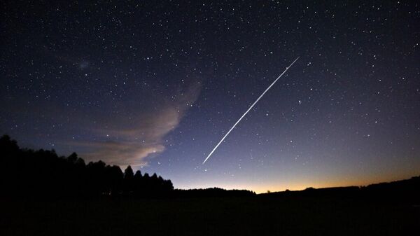 След группы спутников Starlink компании SpaceX. Фото AFP