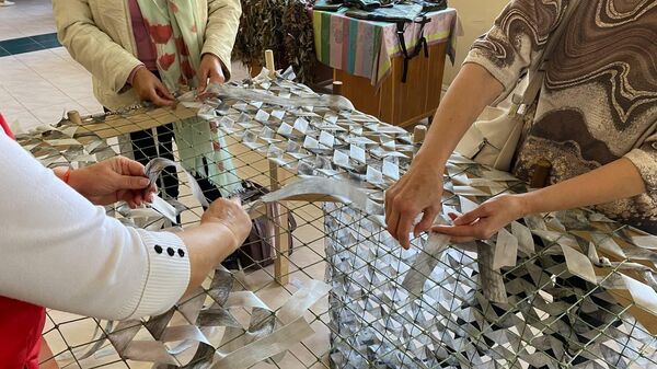 Изготовление маскировочных сетей