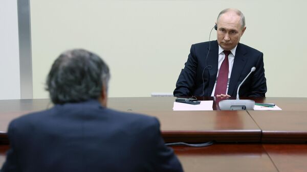 Президент РФ Владимир Путин во время встречи с генеральным директором Международного агентства по атомной энергии Рафаэлем Гросси