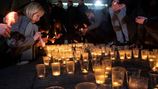 Акция в память жертв теракта в Крокус сити холле 