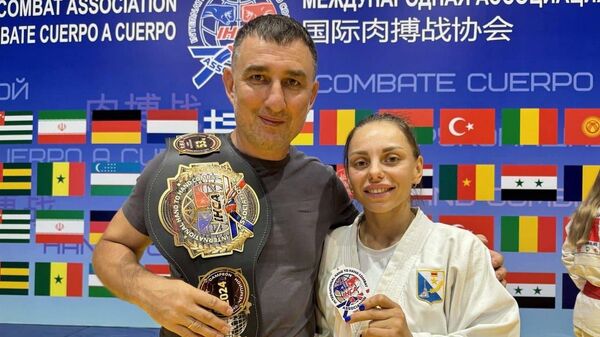 Дарья Крапивина и ее тренер Алексей Заднипровский