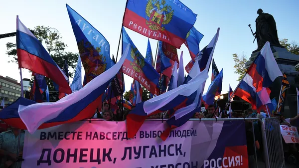 Празднование присоединения к России новых регионов в Симферополе