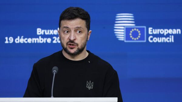 Владимир Зеленский выступает на пресс-конференции во время саммита ЕС в Брюсселе в четверг, 19 декабря 2024 года. (AP Photo/Omar Havana)