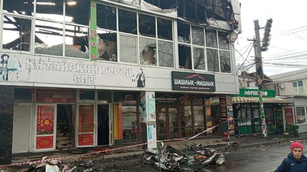 Последствия пожара в торговом центре на Центральном рынке в Симферополе