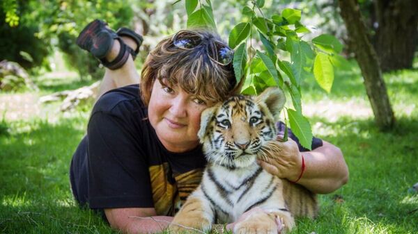  Сотрудница ялтинского зоопарка Сказка и парка львов Тайган Татьяна Алексагина 
