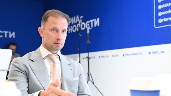 Генеральный директор АО Глонасс Алексей Райкевич на стенде РИА Новости.