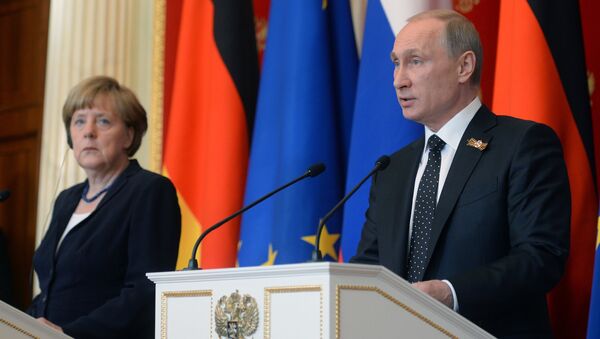 Совместная пресс-конференция президента РФ В.Путина и канцлера Германии А.Меркель. Архив