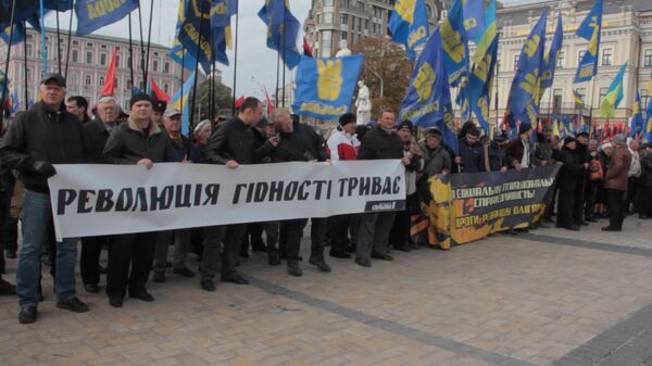 Националисты с портретами Бандеры прошли по Киеву в годовщину создания УПА Националисты с портретами Бандеры прошли по Киеву в годовщину создания УПА