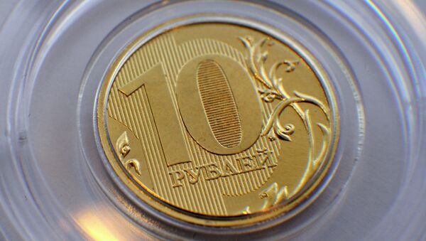 Презентация новой 10-рублевой монеты прошла в Центробанке в Москве