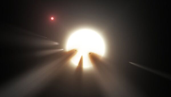Так художник представил себе рой комет у звезды KIC 8462852