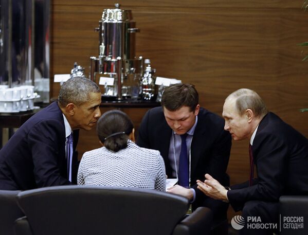 Президент России Владимир Путин во время беседы с президентом США Бараком Обамой на полях саммита Группы двадцати (G20)