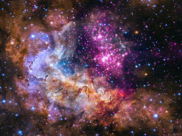 Кластер молодых звезд примерно в 20 000 световых лет от Земли