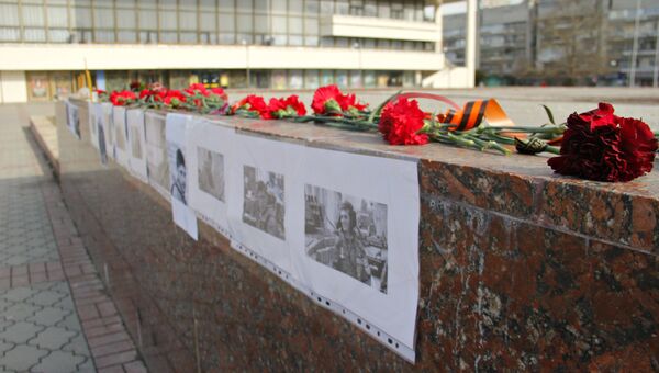 В Симферополе состоялась акция в память о погибшем в Донецкой народной республике командира батальона Сомали Михаила Толстых (Гиви)