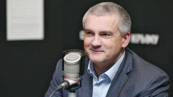 Глава Республики Крым Сергей Аксенов в студии радио Спутник в Крыму. Архивное фото