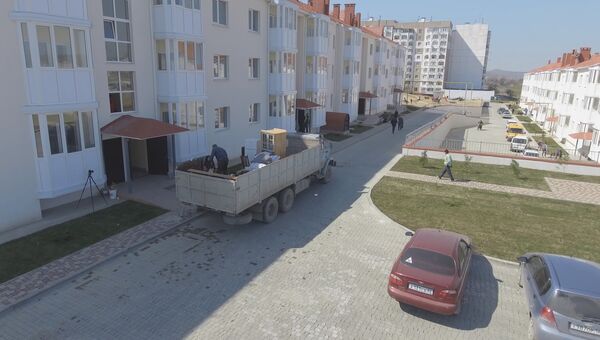 Новые дома для переселенцев из зоны строительства моста в Крым. Съемка с воздуха