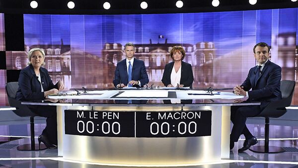 Кандидаты в президенты Франции Марин Ле Пен и Эммануэль Макрон