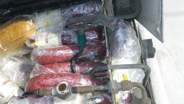 Колбаса, которую украинцы пытались провезти в Крым в переоборудованных машинах
