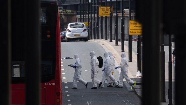 Судебные криминалисты на северной стороне Лондонского моста после теракта в ночь на 4 июня