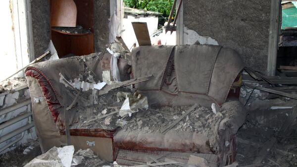 Повреждения в жилом доме, полученные в результате артиллерийского обстрела ВСУ
