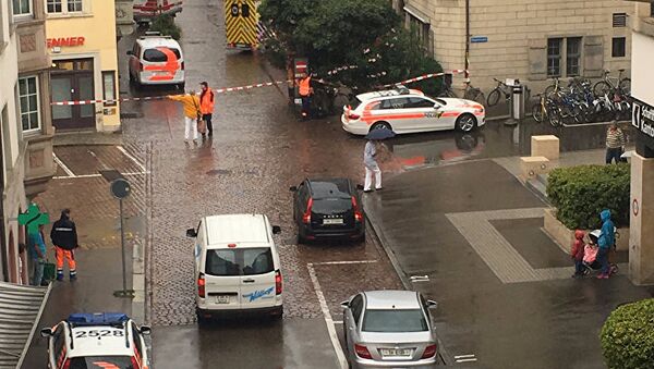 На месте нападения неизвестного человека с бензопилой в Шаффхаузене, Швейцария. 24 июля 2017