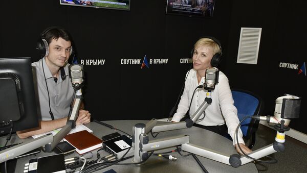 Обозреватель Андрей Матюхин и шеф-редактор радио Спутник в Крыму Ирина Мульд