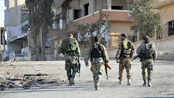 Сирийские солдаты в Хомсе. Архивное фото