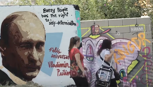 Граффити с изображением президента России Владимира Путина в Барселоне, Испания. 7 октября 2017