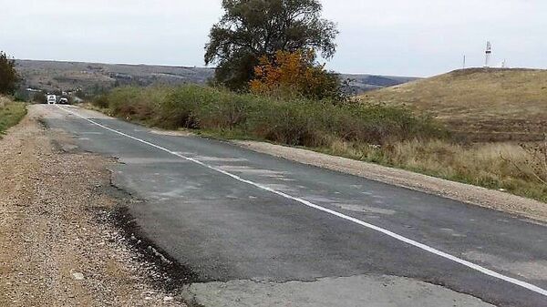 Отремонтированный участок дороги в селе Пожарское Симферопольского района Отремонтированный участок дороги в селе Пожарское Симферопольского района