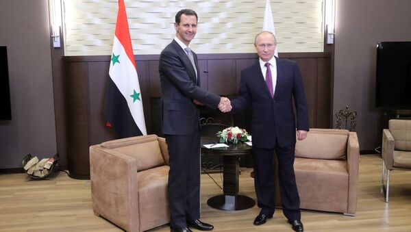 Президент РФ Владимир Путин и президент Сирии Башар Асад во время встречи. 20 ноября 2017