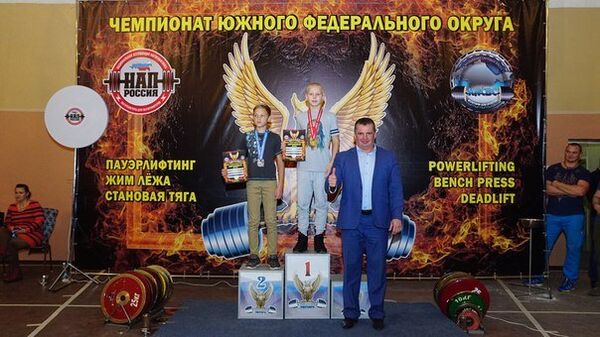 Иван Афанасьев - кандидат в мастера спорта по народному жиму Крымской ассоциации силовых видов спорта, чемпион Крыма на пьедестале победителя Иван Афанасьев - кандидат в мастера спорта по народному жиму Крымской ассоциации силовых видов спорта, чемпион Крыма на пьедестале победителя