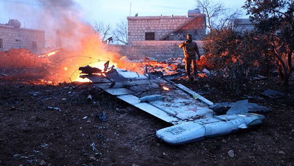 Обломки сбитого боевиками российского самолет Су-25 в Сирии. 3 февраля 2018