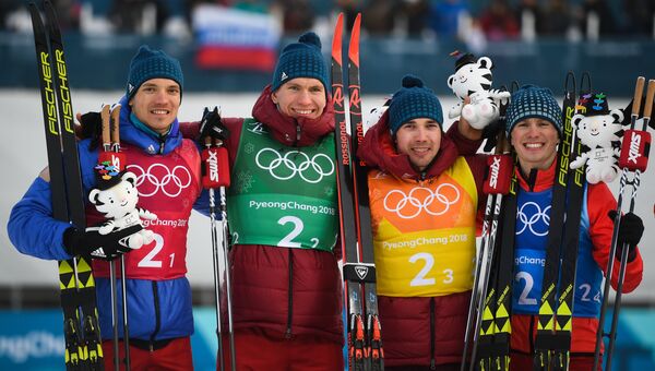 Российские спортсмены Андрей Ларьков, Александр Большунов, Алексей Червоткин и Денис Спицов (слева направо)