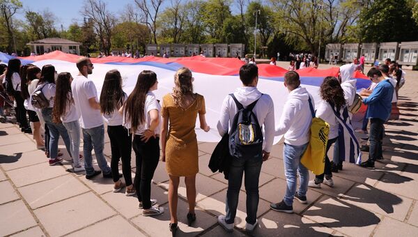 Акция Флаг моего государства в рамках II Всероссийский молодежный межнациональный фестиваль Крымский маяк в Севастополе