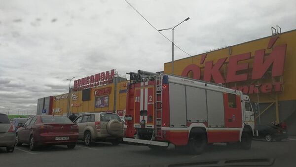 Пожарные машины у ТЦ Комсомол в Иркутске