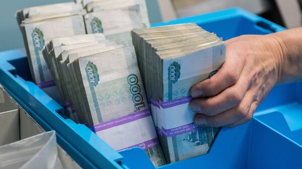 Паллет с банкнотами номиналом по тысяче рублей. Архивное фото