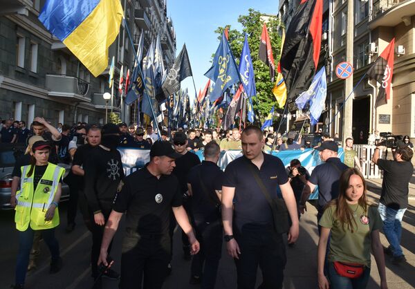 Участники марша националистов, приуроченного к четвёртой годовщине событий 2 мая 2014 года в Доме профсоюзов в Одессе Участники марша националистов, приуроченного к четвёртой годовщине событий 2 мая 2014 года в Доме профсоюзов в Одессе
