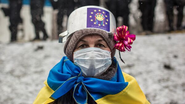 Участница протестных митингов за евроинтеграцию Украины на улице Грушевского в Киеве